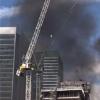 在33层高的Canary Wharf塔顶上发生火灾