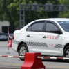 科目一考试:上路行驶的机动车未放置检验合格标志的交通警察可依法扣留机动车