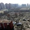 北京市棚户区改造共有236个项目占地面积13430公顷包括23550户